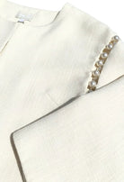 Fee G pearl sleeve detail close-up on Nancy jacket