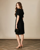 Knee-length black occasion dress by FeeG for parties or dinners