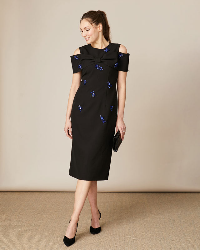 Fee G Phoebe black off-shoulder midi occasion dress with oversized bow detail.