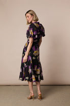 Back view of Fee G Emily black floral midi dress