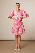 Fee G Eve floral print mini dress back view in pink