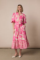 Fee G Eve pink floral print tiered midi dress front view