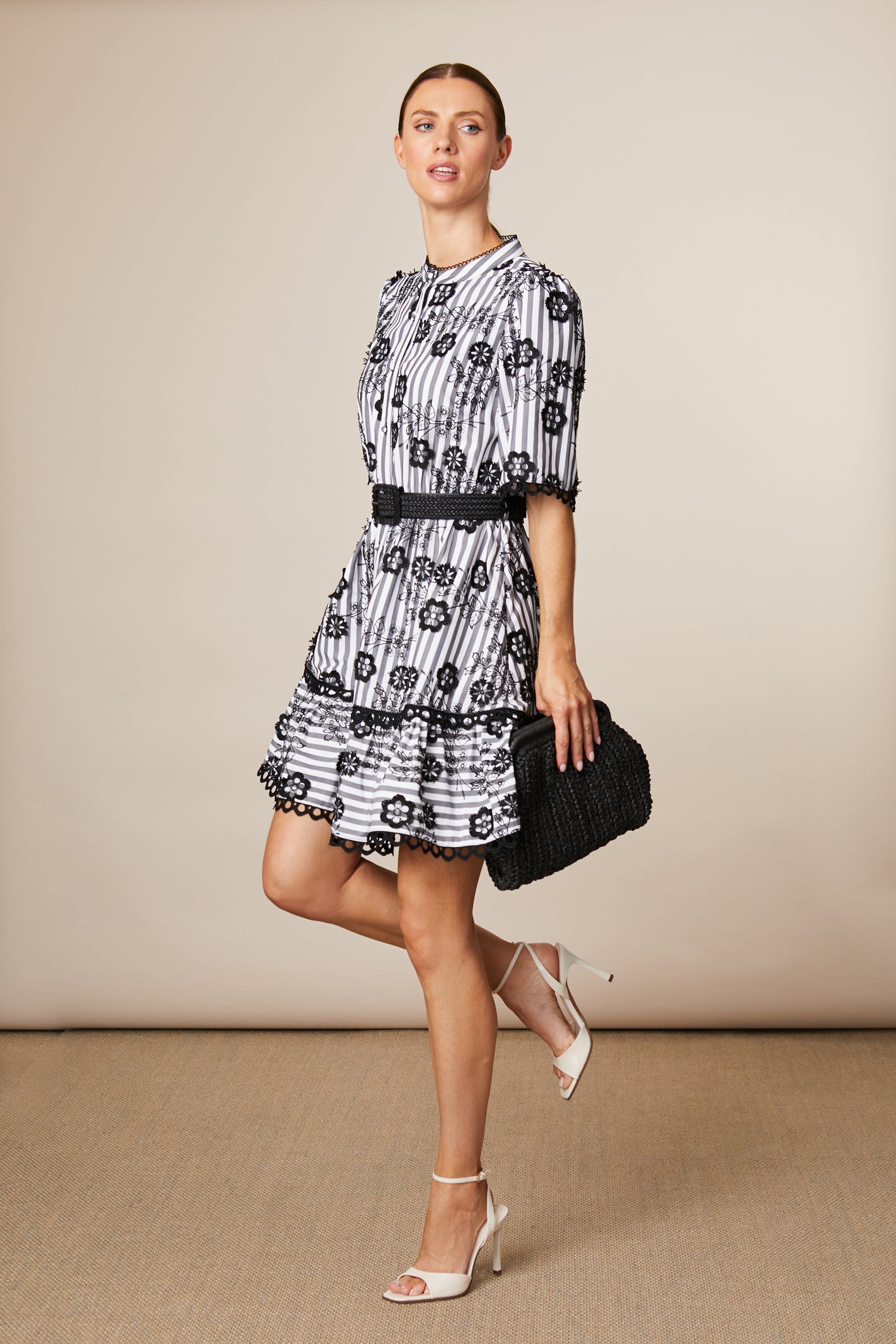 Fee G June black and white stripe floral flock short dress with scalloped lace hem, angled view