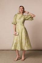 Fee G Kate green paisley puff sleeve midi dress styled with gold accessories