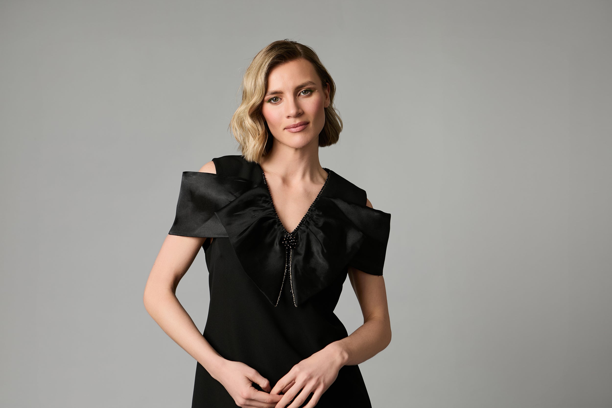 Fee G Coco black V-neck dress with statement organza bow shoulders