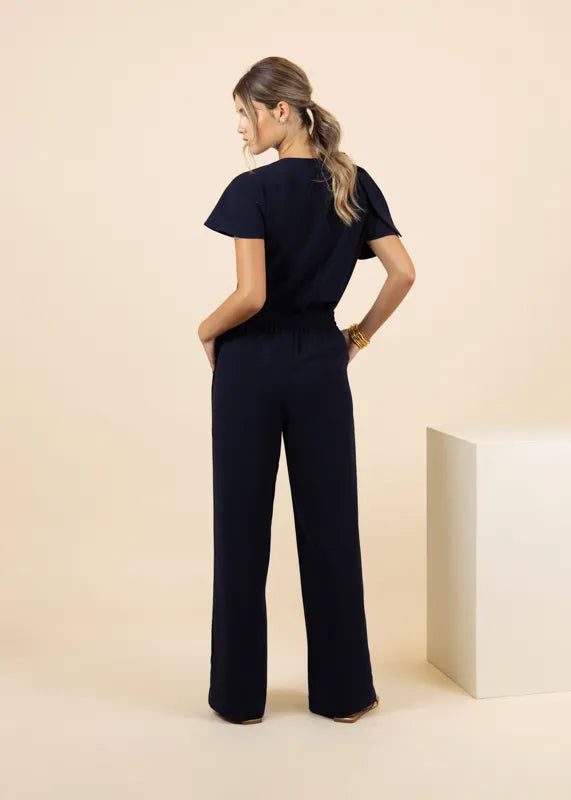 Fee G Corina Navy Short Sleeve Knot Top From The Back