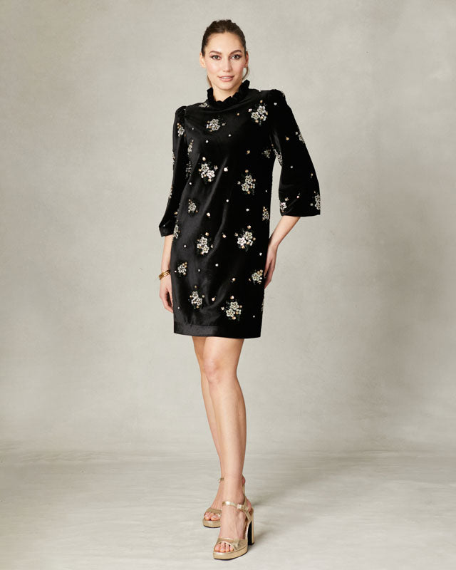 Model wearing Fee G Astrid black velvet beaded mini dress