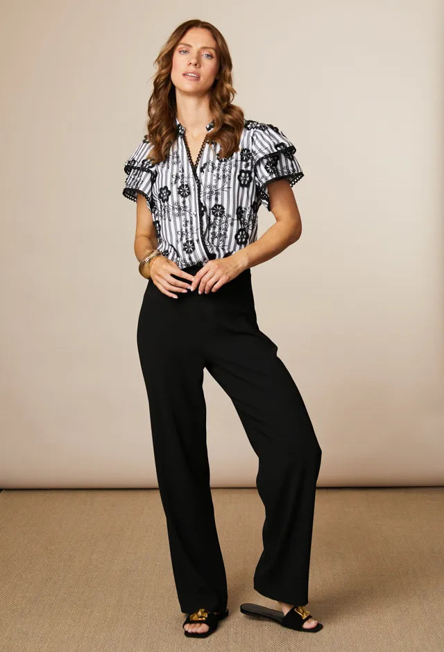 Fee G Ria black and ivory floral stripe blouse with lace trim V neckline and frilled sleeves