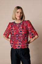 Fee G Lori red and navy floral lace dressy top front view