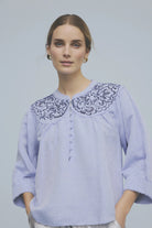     Gustav Annsophie blue embroidered collar blouse front view