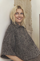 Gustav Nora brown tweed cape jacket with short cape sleeves – side model view