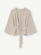 Gustav Liva Light Latte belted wool cape cardigan with textured knit and wide sleeves – front product view