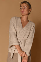 Gustav Liva Light Latte wool cape cardigan with tie belt and wide sleeves – model view