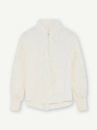 Gustav Cana off-white lace blouse with high neckline, long sleeves and floral lace detailing – back view