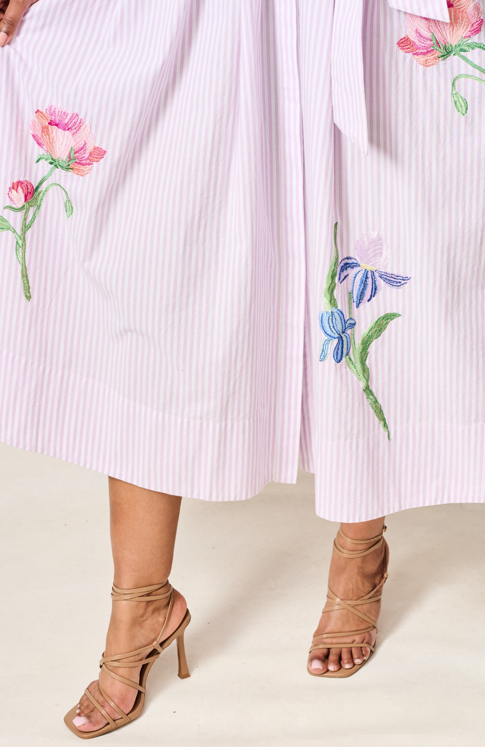     Hope & Ivy Merrin floral embroidery detail on striped skirt