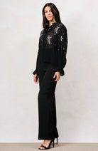 Hope & Ivy Elaris black beaded mesh party top with keyhole neckline – three-quarter model view