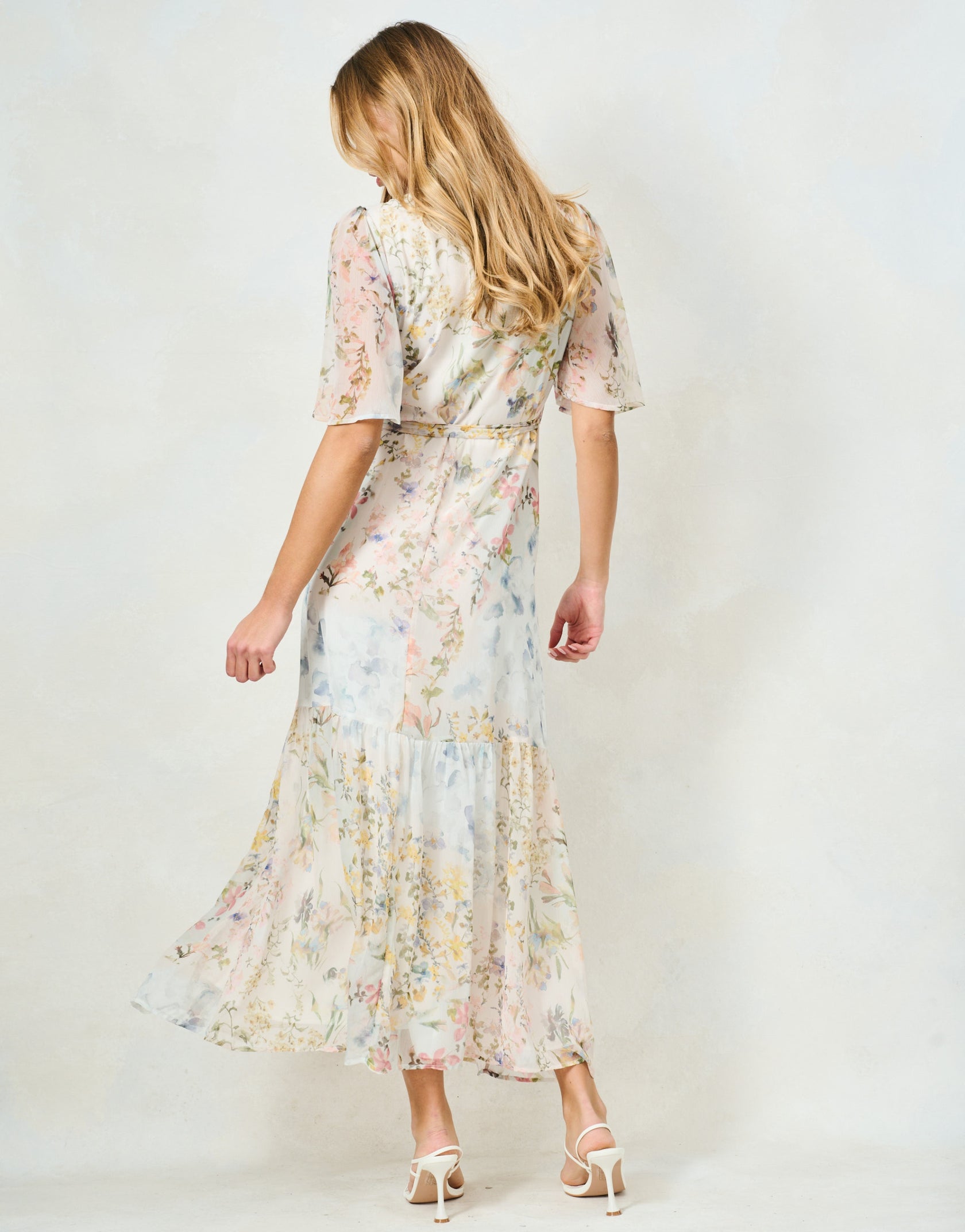 Hope & Ivy Haven flowing floral maxi dress rear view