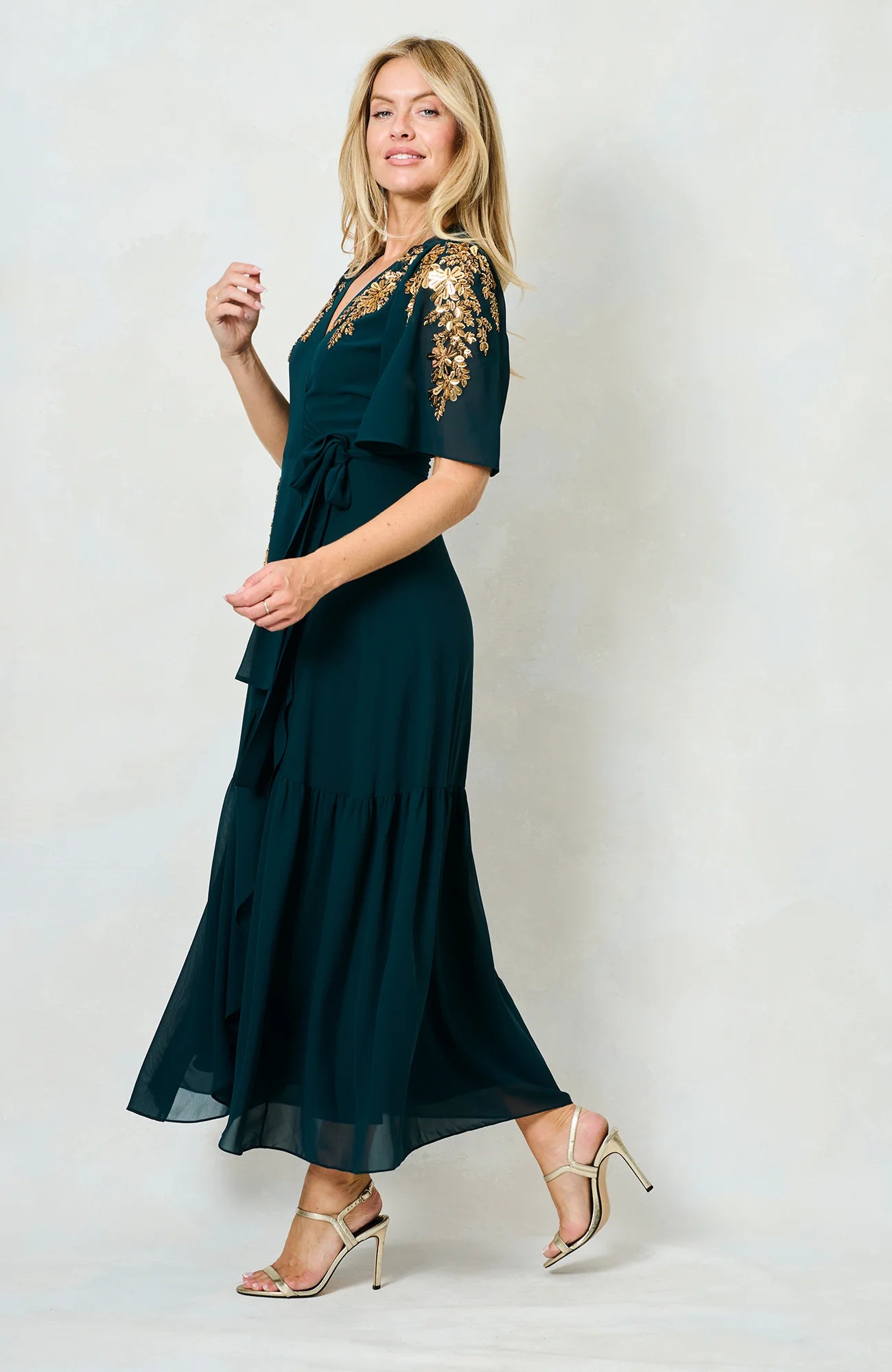 Side view of Hope & Ivy Matilda flutter sleeve maxi wrap dress