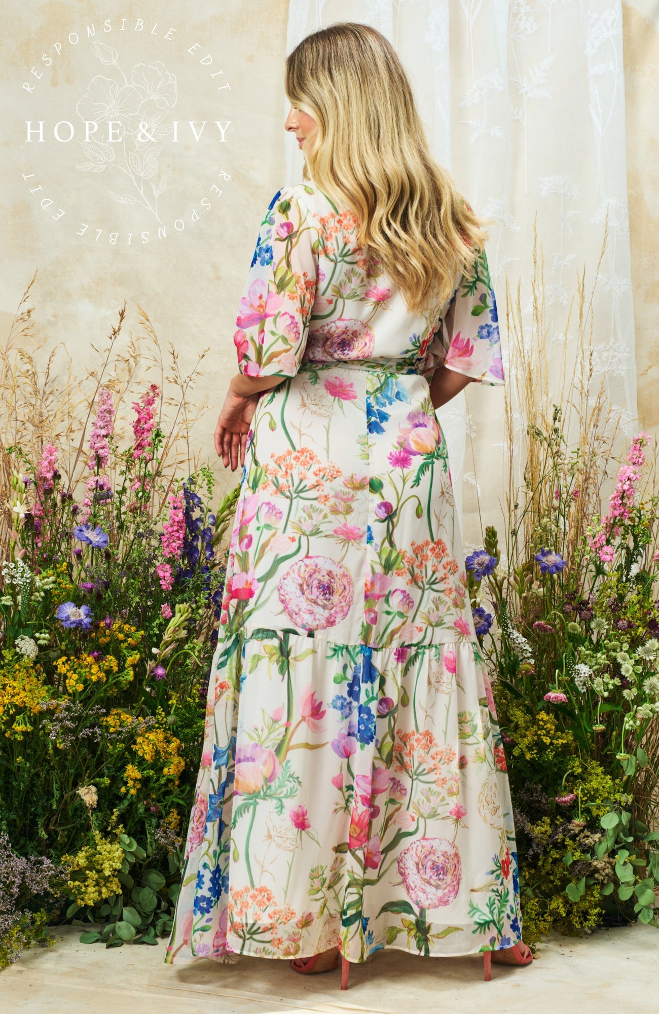 Hope & Ivy Michelle flutter sleeve maxi wrap dress side view