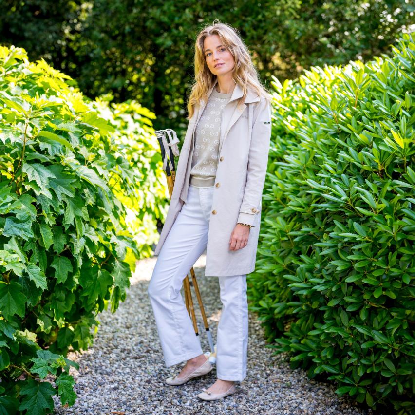 HV Society Piper Classic Trenchcoat worn open with neutral outfit outdoors