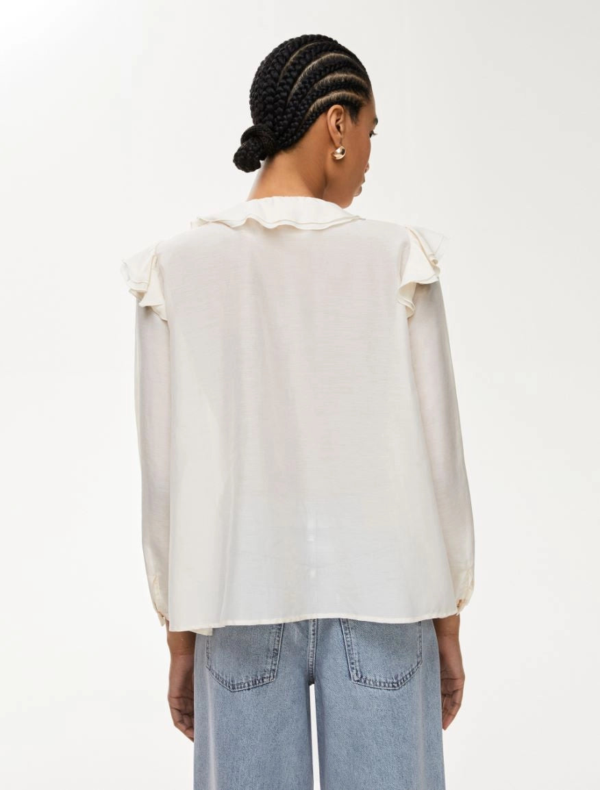 Back view of ivory iBlues blouse with romantic ruffle trim