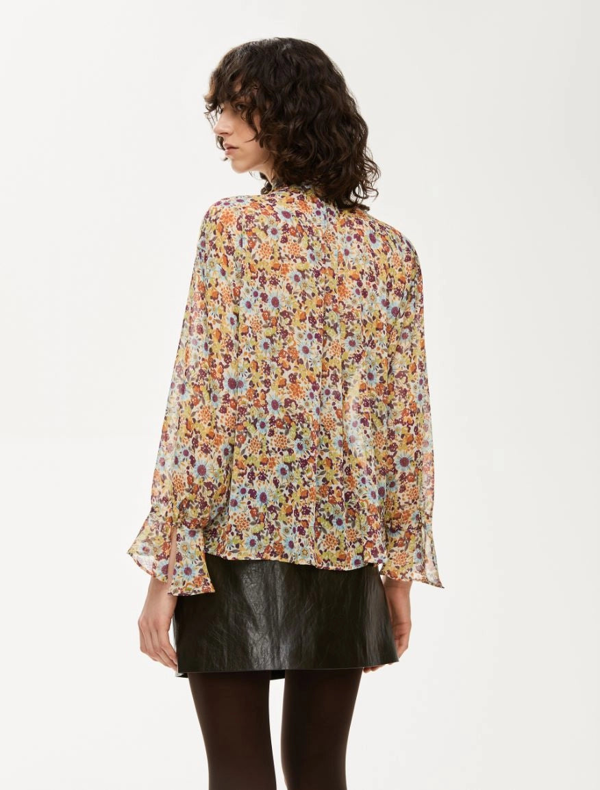 Back view of beige iblues floral blouse with gathered detailing