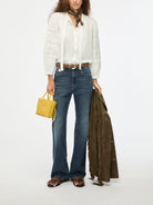 iBlues cream lace blouse styled with denim jeans 