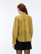 Back view of iBlues Iblasti olive sheer blouse with long sleeves