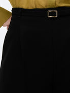    Close-up of iBlues Iblbambina black shorts with slim buckle belt