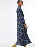 Side view of iBlues Ibleffetto navy satin dress showing the flared skirt