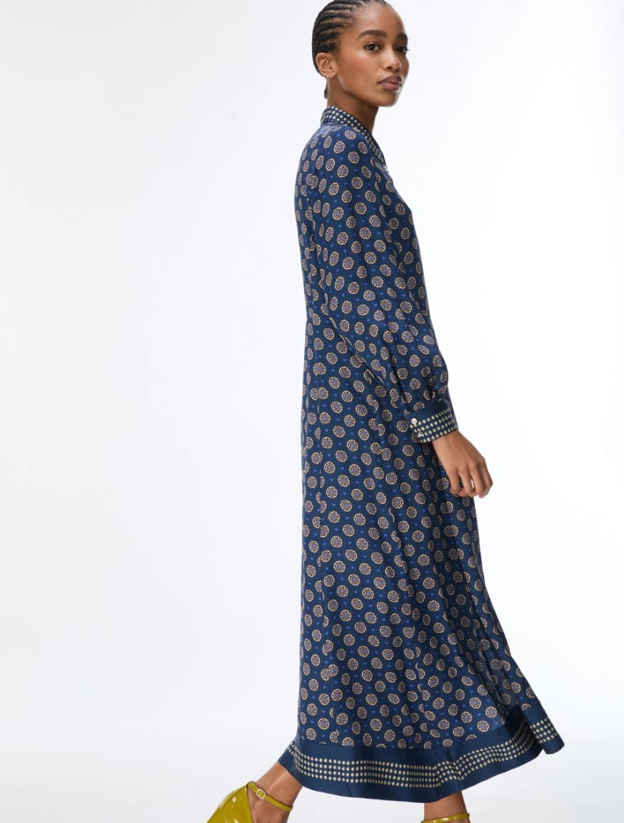 Side view of iBlues Ibleffetto navy satin dress showing the flared skirt