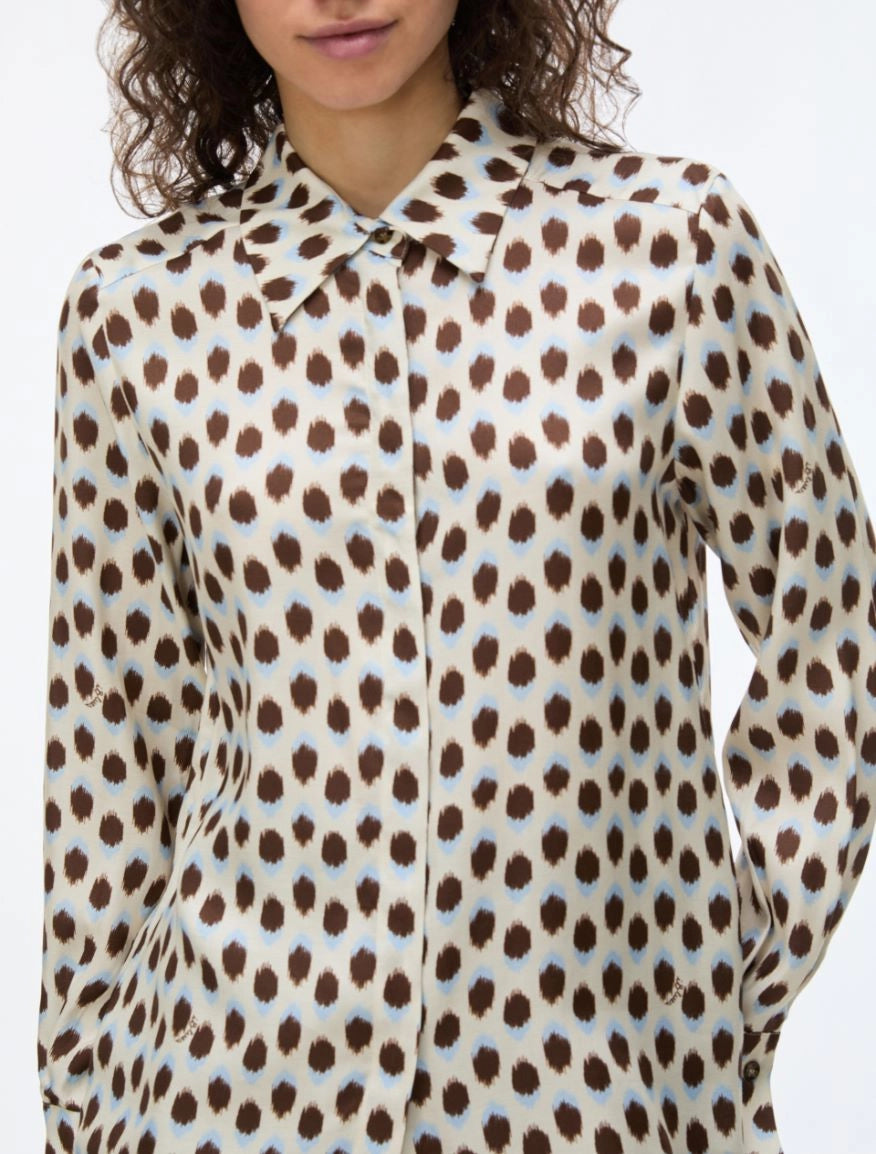 Close-up of iBlues Iblodissea ivory and brown polka dot shirt