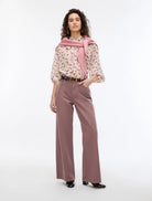     iBlues Iblsecolo pink animal print bow blouse styled with wide-leg trousers