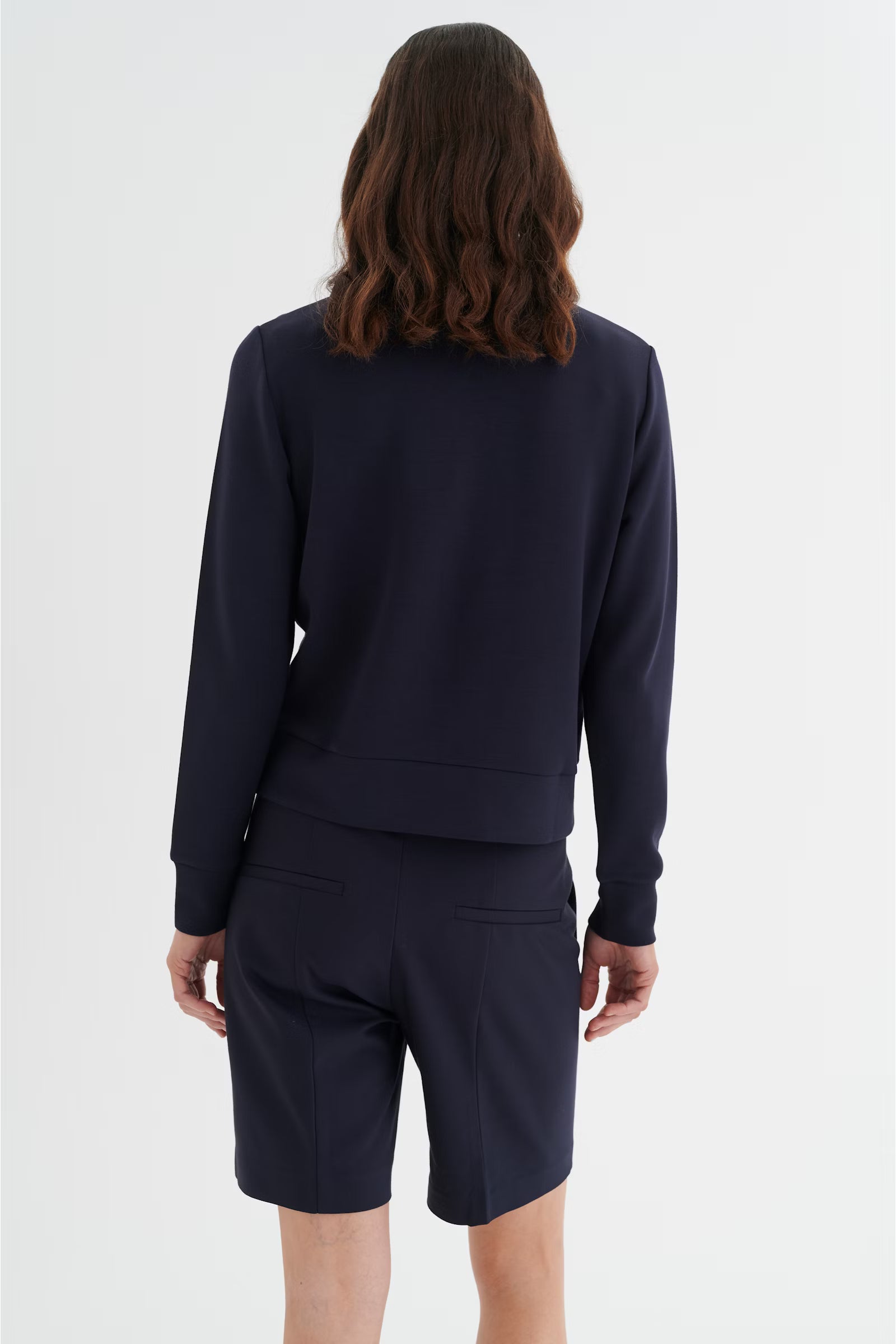 Rear view of InWear BecaI navy jacket with long sleeves and rib hem