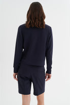 Rear view of InWear BecaI navy jacket with long sleeves and rib hem