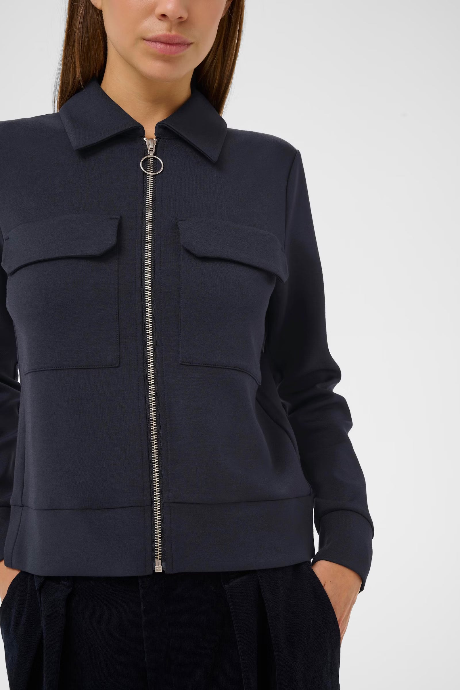 Cropped close-up of InWear navy sweat jacket front details
