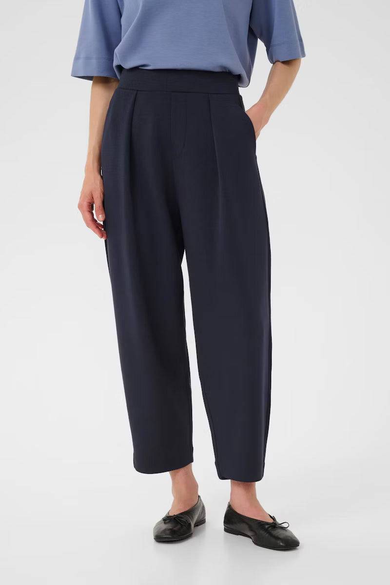 Full length styled front shot of InWear PannieI trousers with black work shoes 