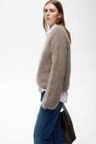 InWear Jetra relaxed knit jumper side view with denim