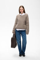 InWear Jetra relaxed crew neck jumper styled with blue jeans