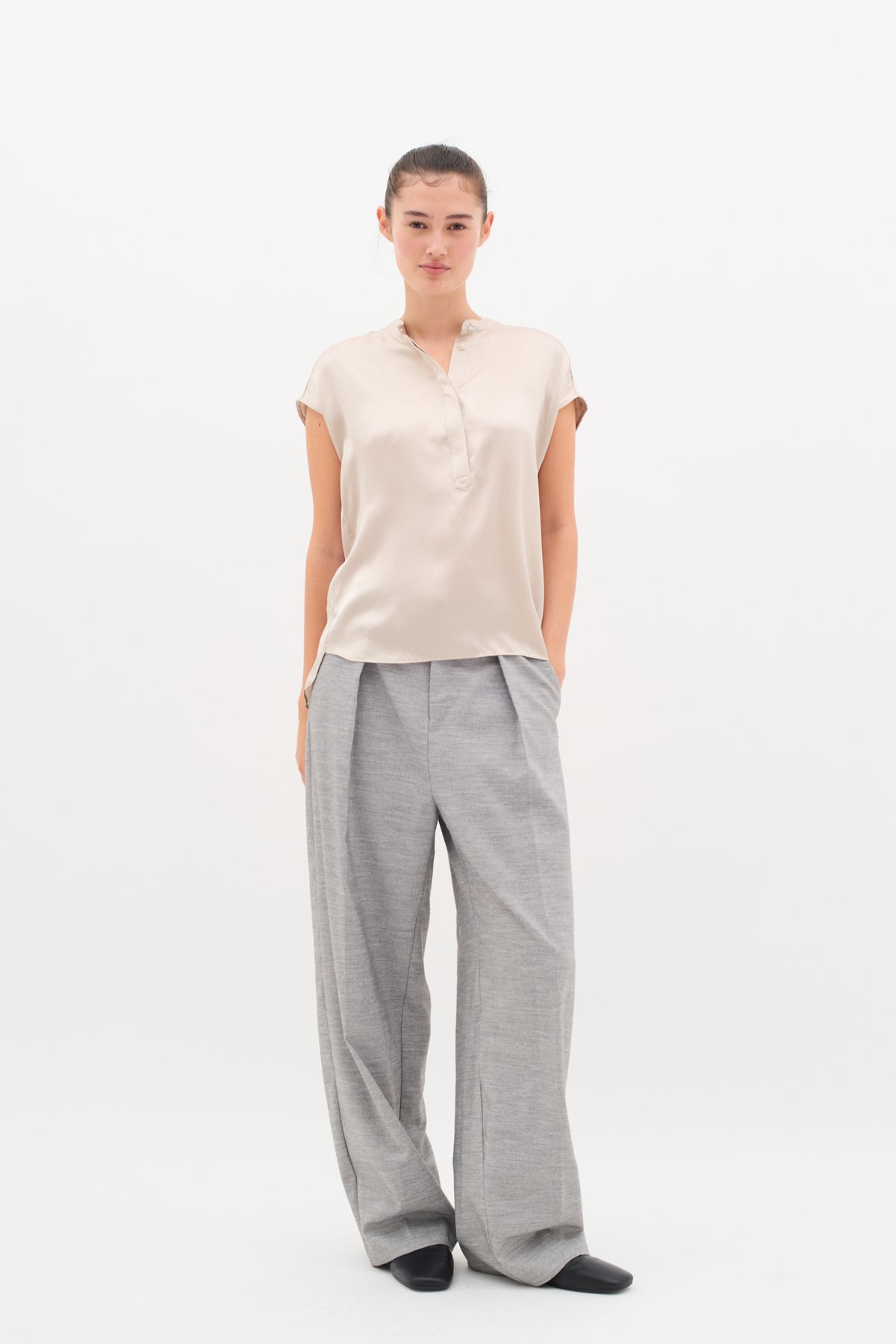 InWear Lucienne silk short sleeve blouse styled with grey tailored trousers