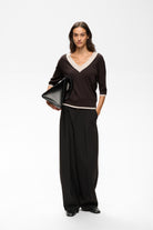 InWear Leenah brown V-neck jumper styled with trousers