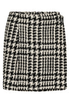 Flat lay of InWear BryaI black and white short women’s tweed skirt