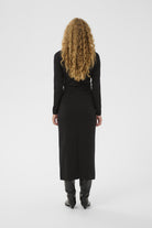 InWear black wrap top back view on model