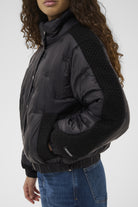 InWear Genoa black puffer jacket side view showing contrast sleeve panel