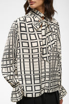 Close-up of InWear Gracie ruffle neck tie dressy blouse