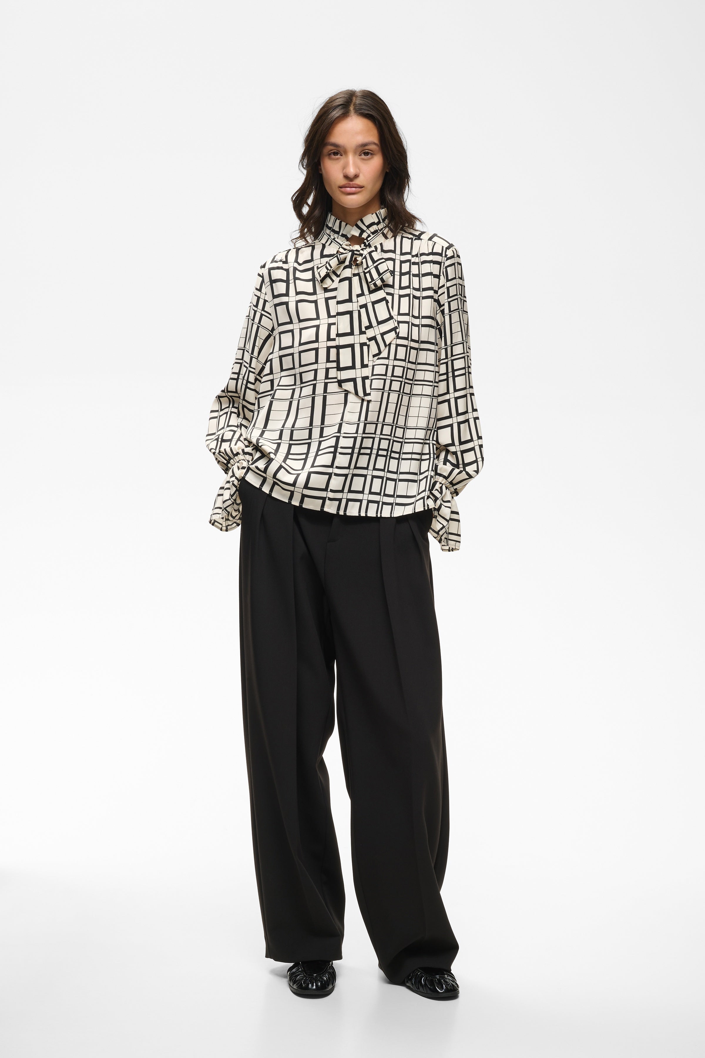 InWear Gracie cream printed blouse styled with black tailored trousers