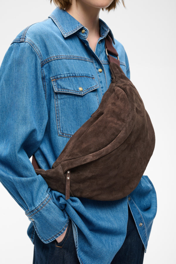 InWear Rasida chocolate brown suede leather sling bag worn crossbody front view