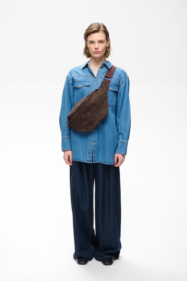 InWear Rasida chocolate brown suede sling bag full-length styling view