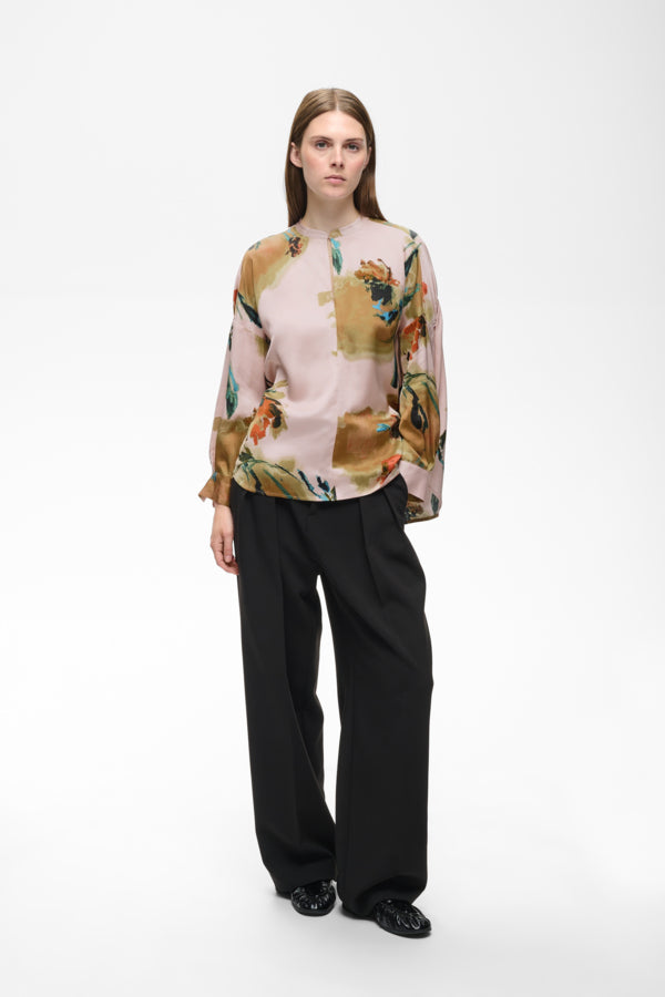 InWear Meadow light pink floral blouse styled with black wide-leg trousers
