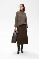 InWear Tally taupe jumper styled with midi skirt and boots